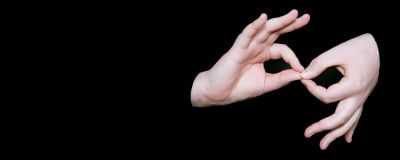 Banner of Caucasian hands signing interpreter in American Sign Language